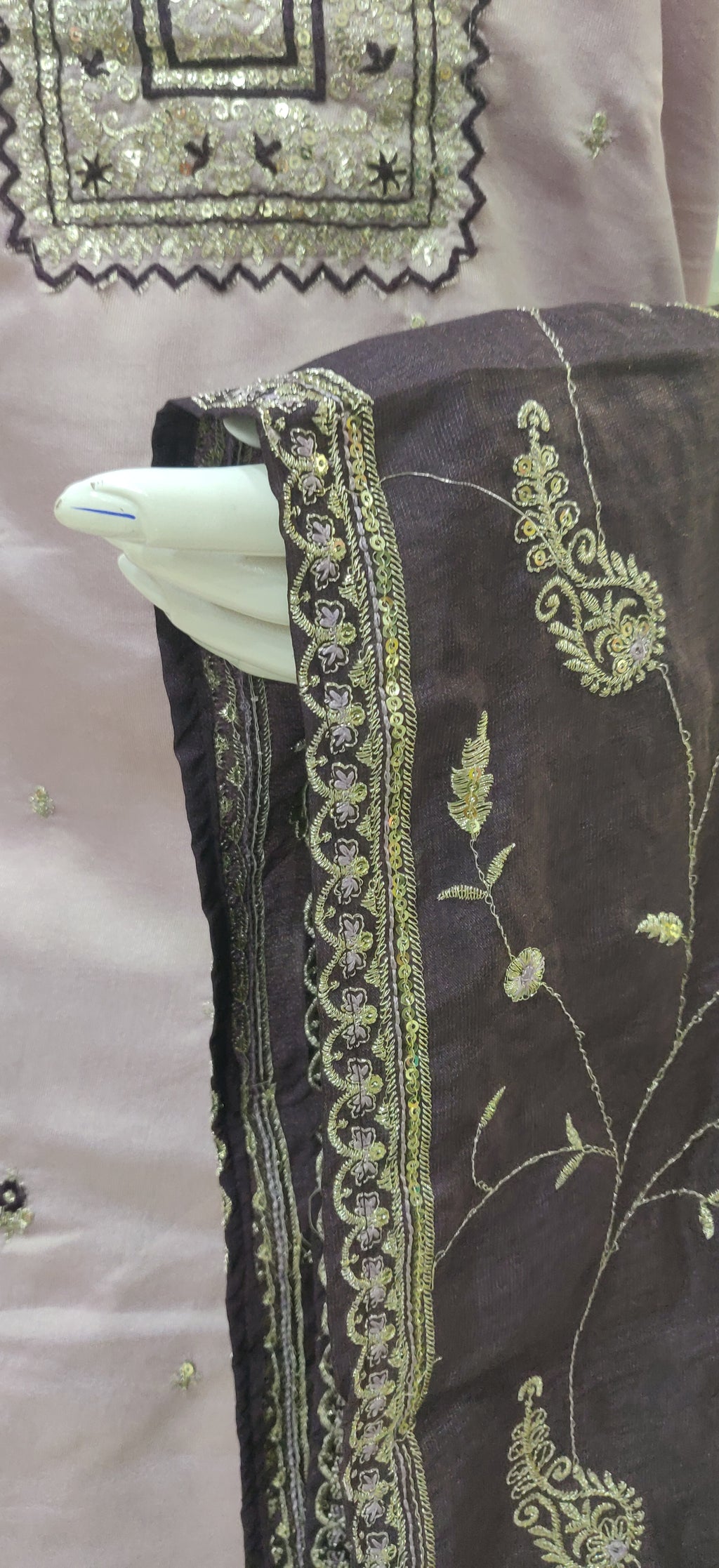 Elevate your ethnic wardrobe with this elegant light lavender-colored salwar kameez set